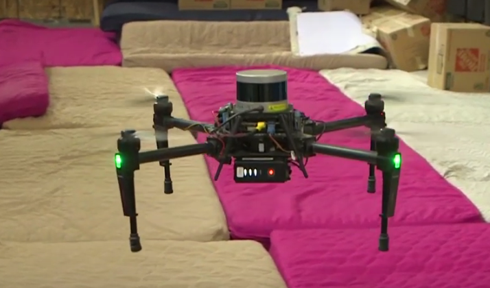A four-legged drone looks like a big black spider.