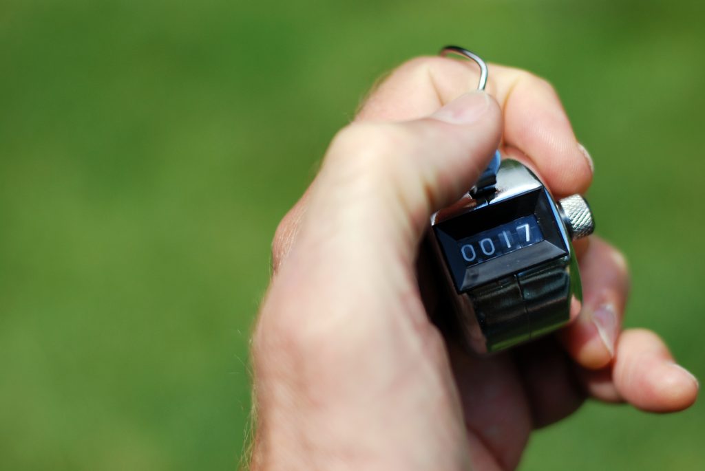 A hand tally counter