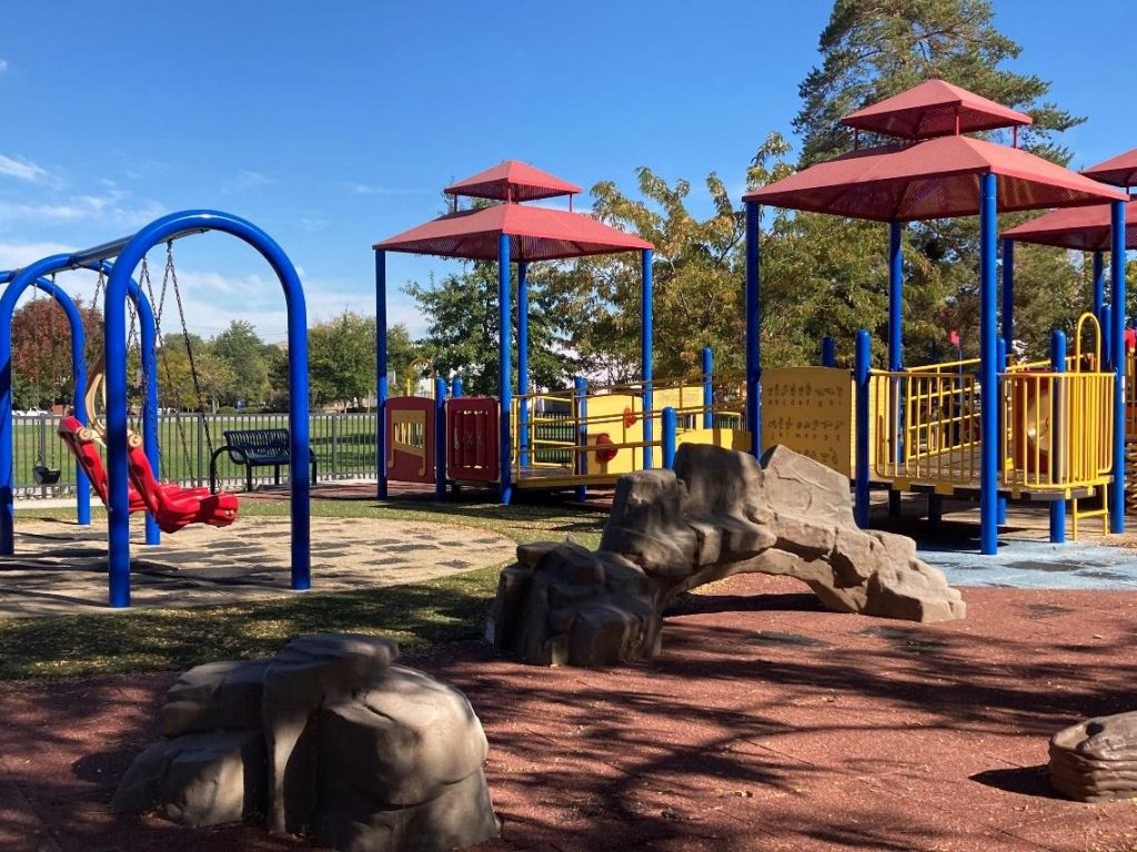 A photo of a playground at Dick Memorial Park