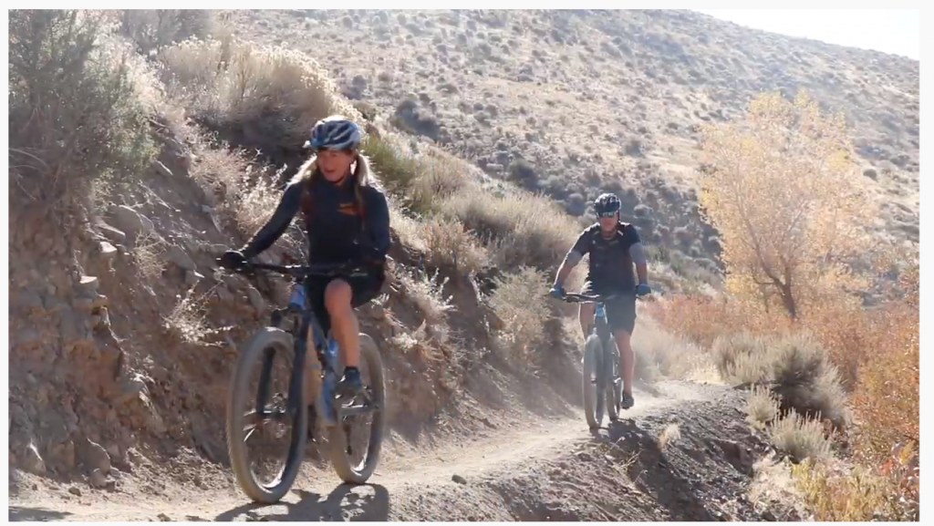 Mountain bikers role down a Nevada trail.
