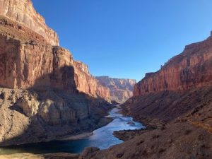 A landscape photo looking down the river from Nankoweap Graneries in the Grand Canyon.