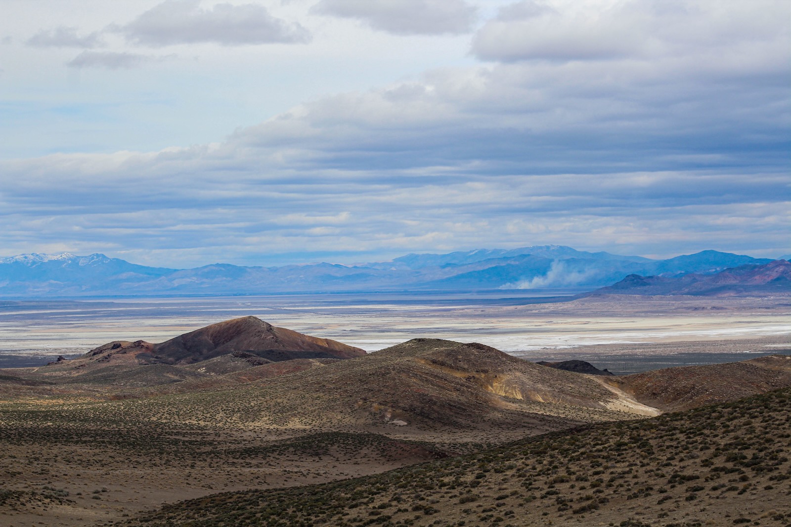 View of ranges and fumaroles from the Desert Peak geothermal field.