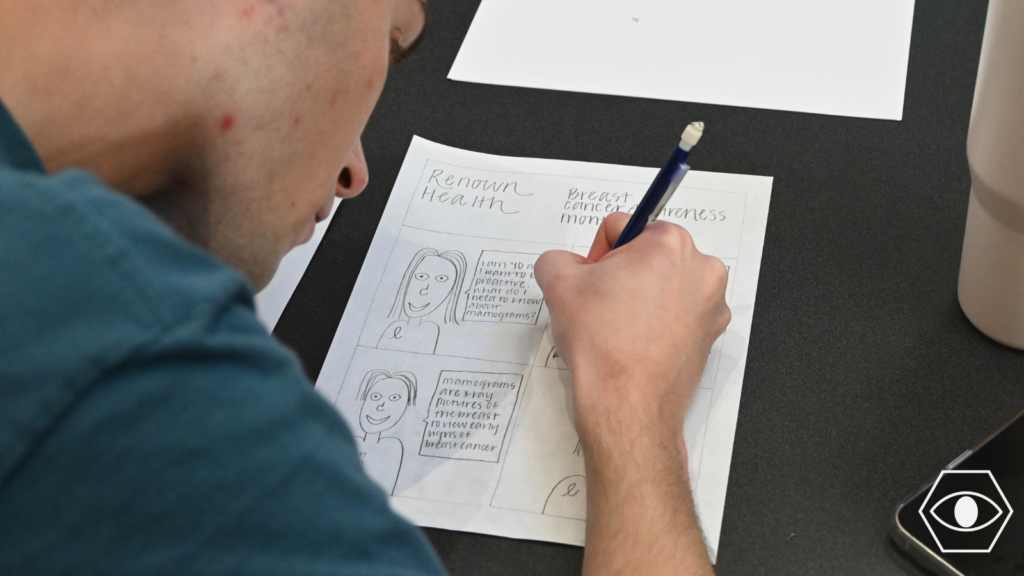 A student works on a science cartoon