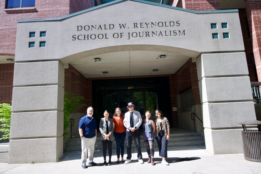 James Tralie stands with UNR students and faculty outside of the Reynolds School of Journalism