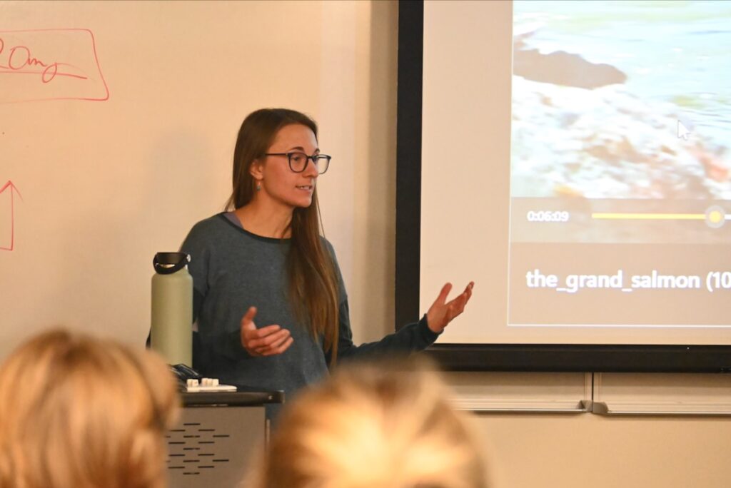 Brooke Hess talks to an audience about her film, The Grand Salmon, at the Reynolds school of journalism in November.